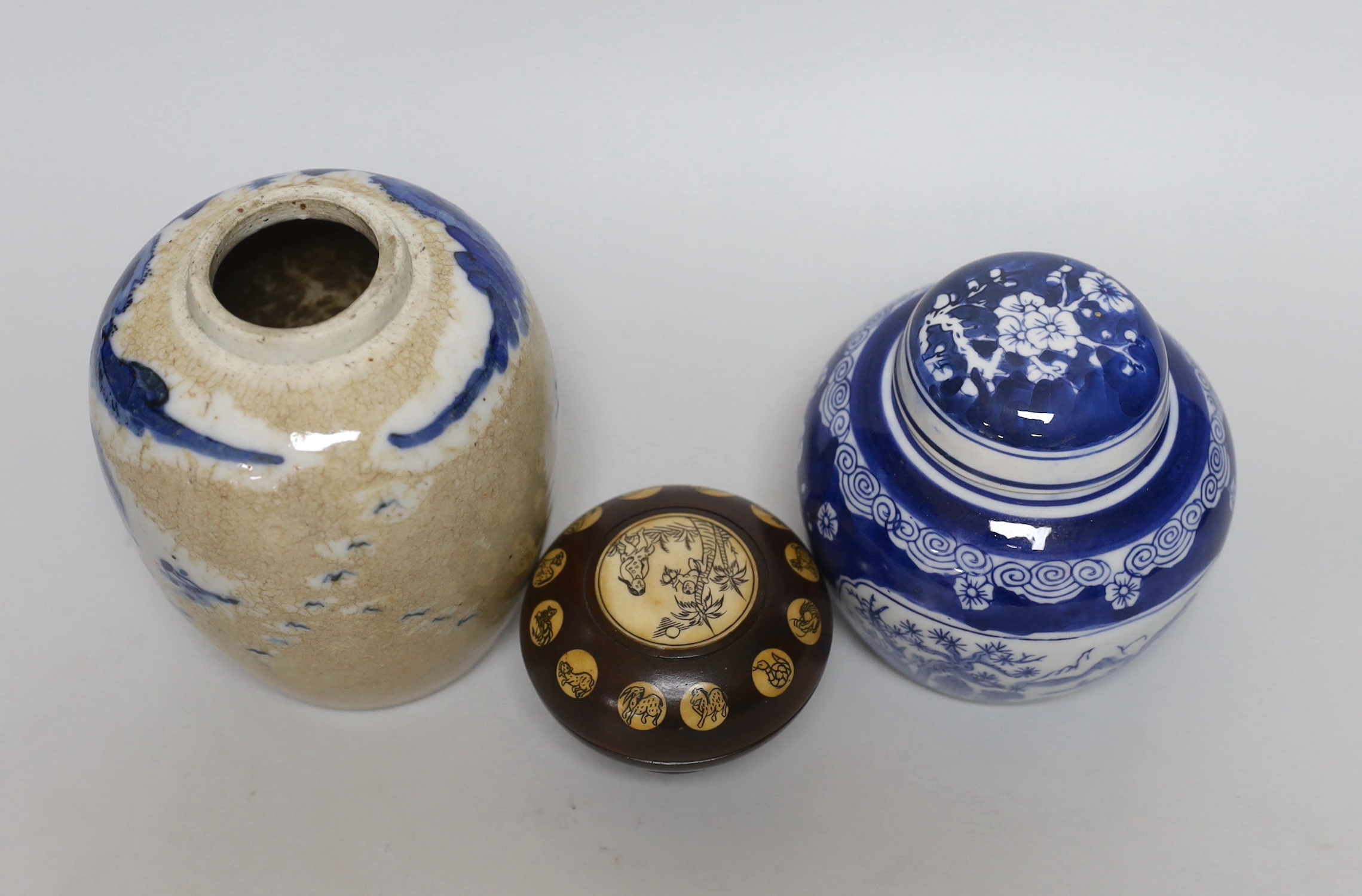 A Chinese ginger jar, another with cover and an ornamental bone and wooden travelling compass, tallest 14cm high